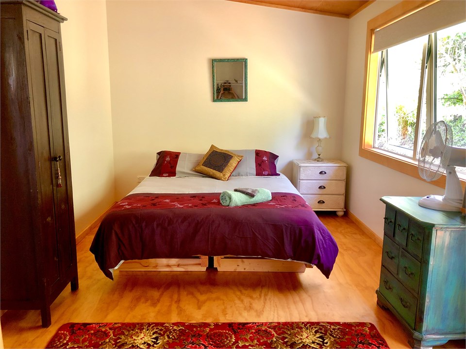 Bedroom 2 made up into a queen bed