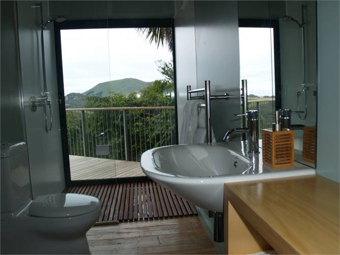 Bathroom with sliding door from shower to outside 