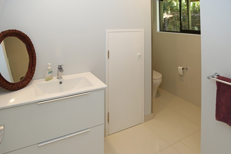 Downstairs bathroom with toilet, shower & vanity