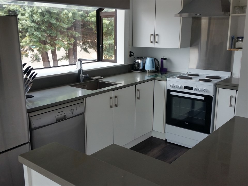 Convenient Kitchen with new stove, rangehood, ston