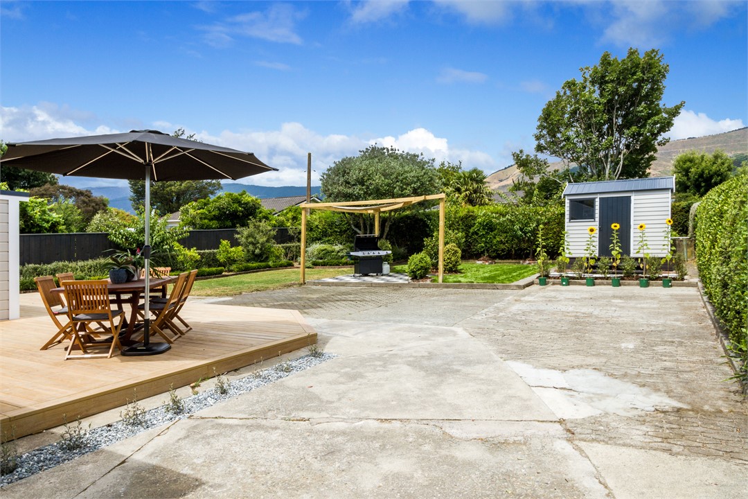 Back deck with BBQ area & parking area