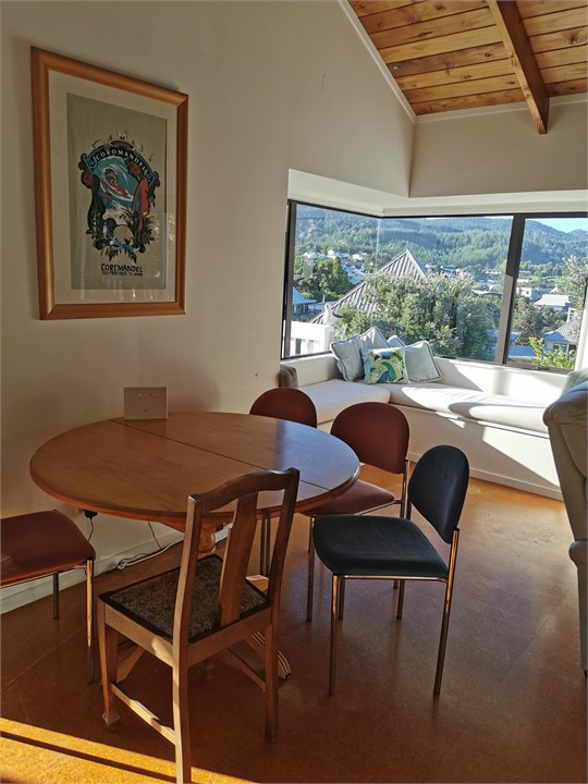 Dining and sunny window seat in open plan living