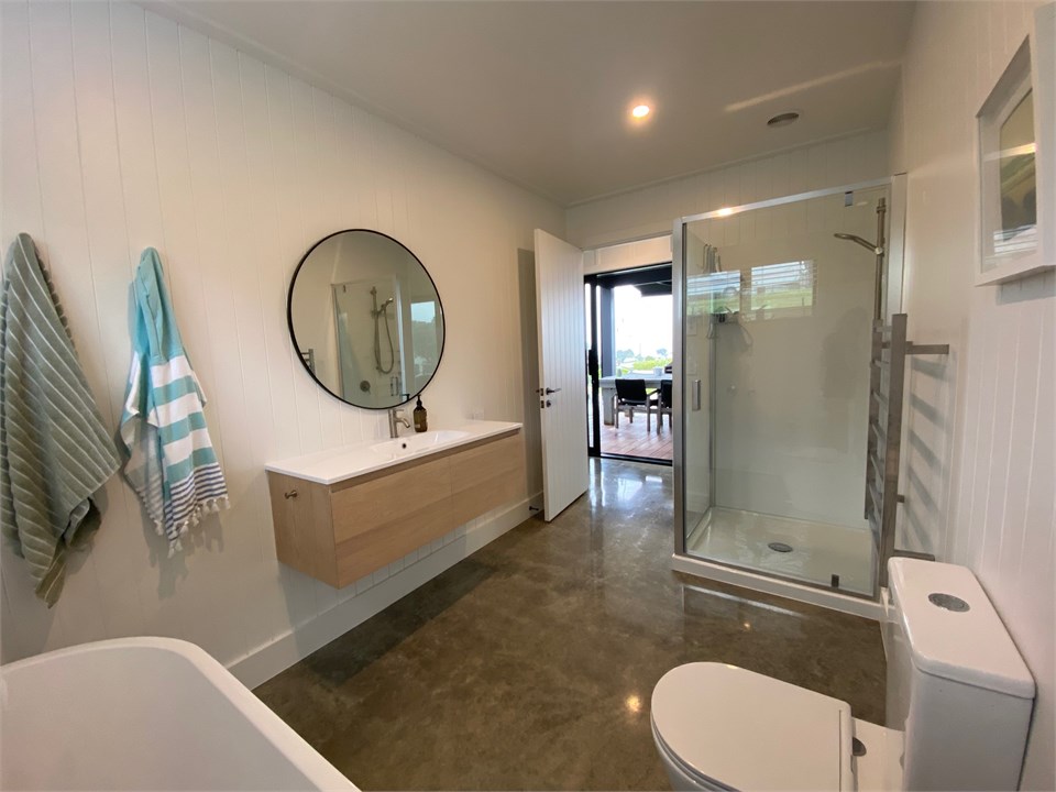 Bathroom with Bath and Heated Towel Rail