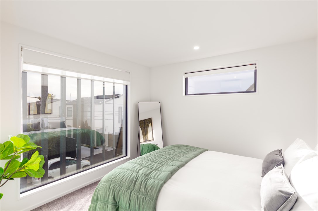 Bedroom 3 has a Queen bed