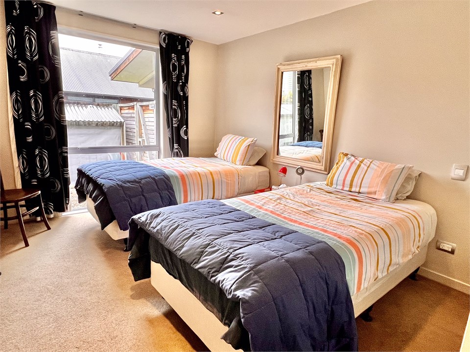 Bedroom 2 has 2 king single beds