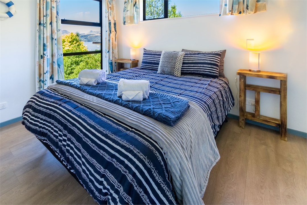 Queen bedroom with sea views