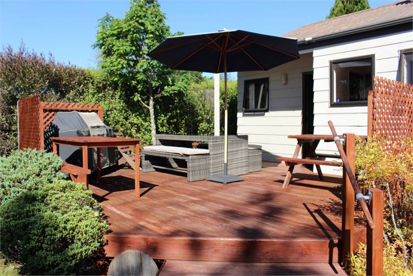 Sunny rear deck with barbeque
