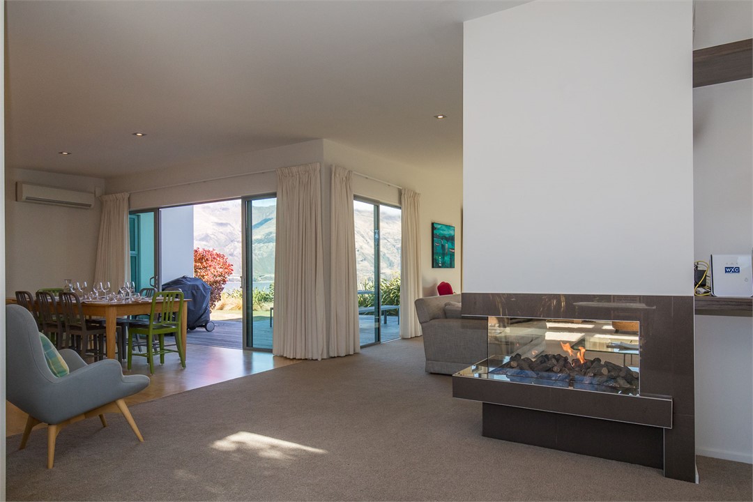 Gas fire separates very large living room into 2 s