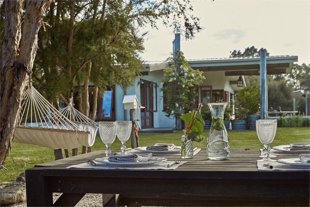 outside kanuka trees lazy days hammock paradise