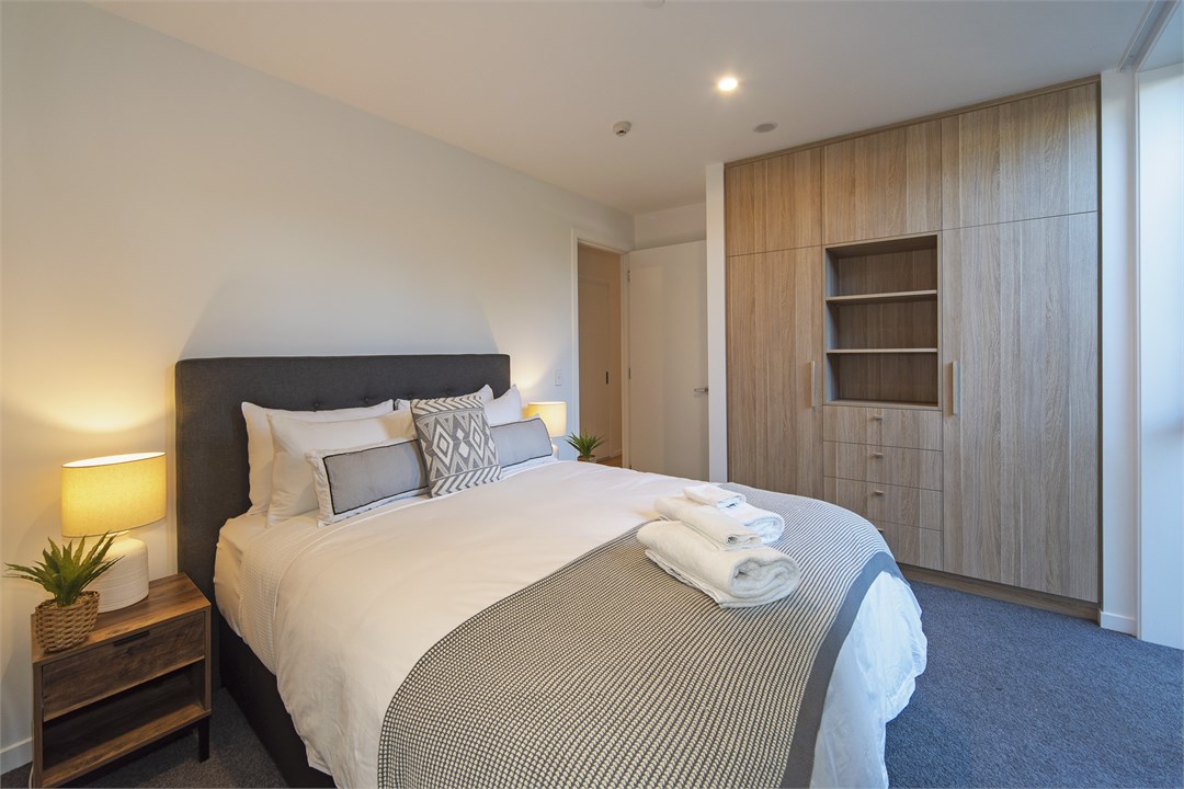 Bedroom 1 with Queen Bed & Robes