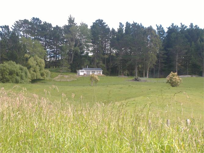sitting privately amidst farmland