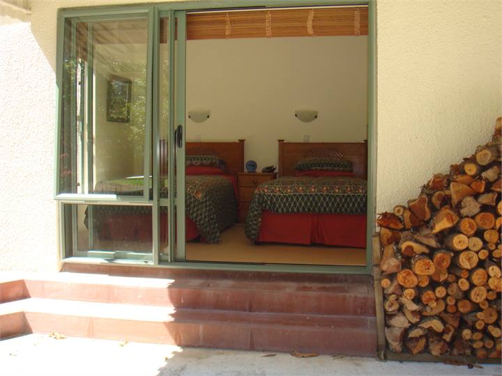 Bedroom facing rear lawn area