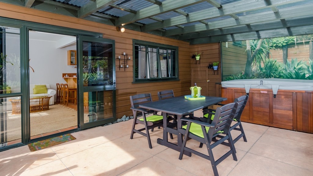 Large covered outdoor area with BBQ