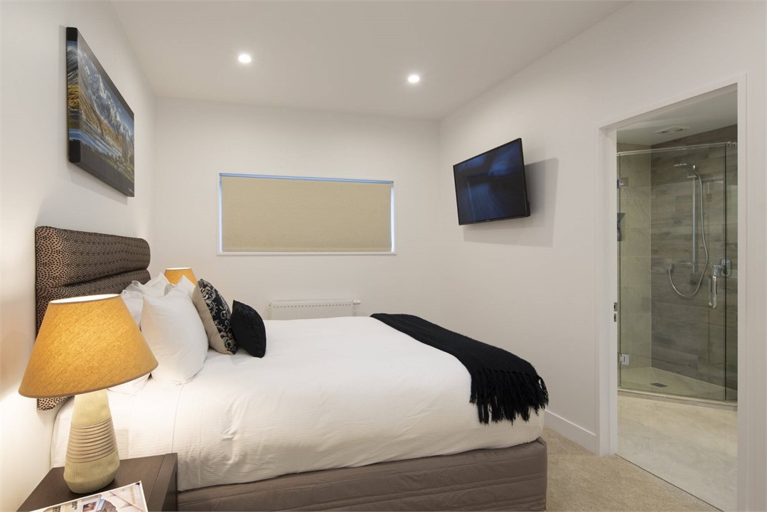 Bedroom 2 with queen and ensuite