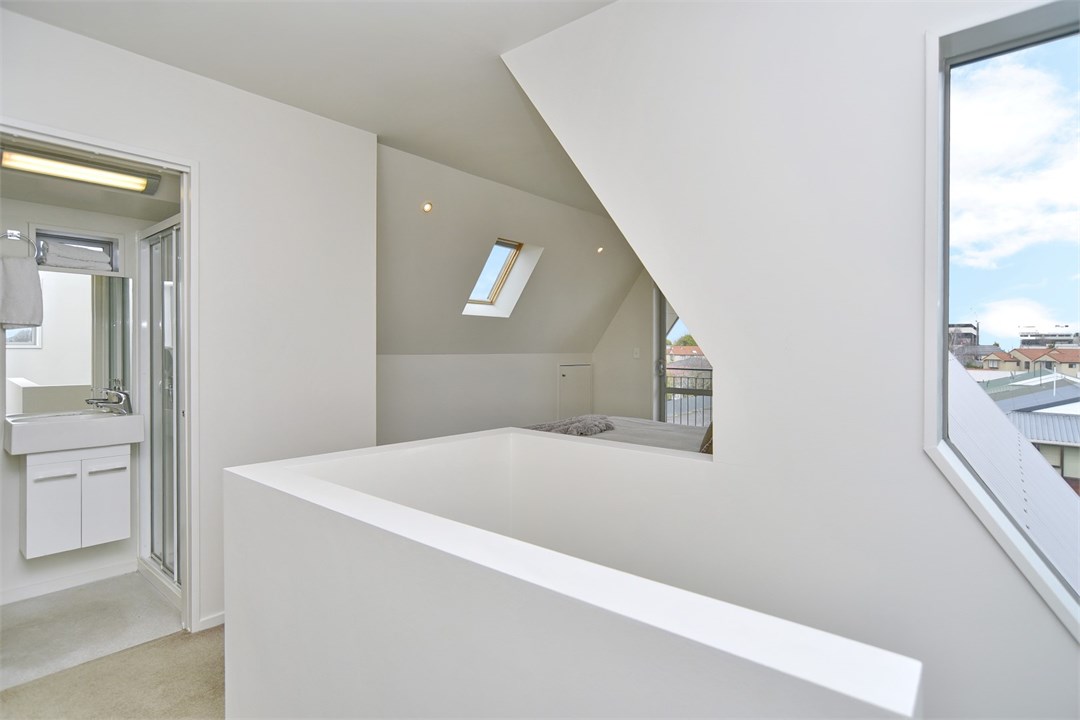View of the upstairs bedroom and bathroom