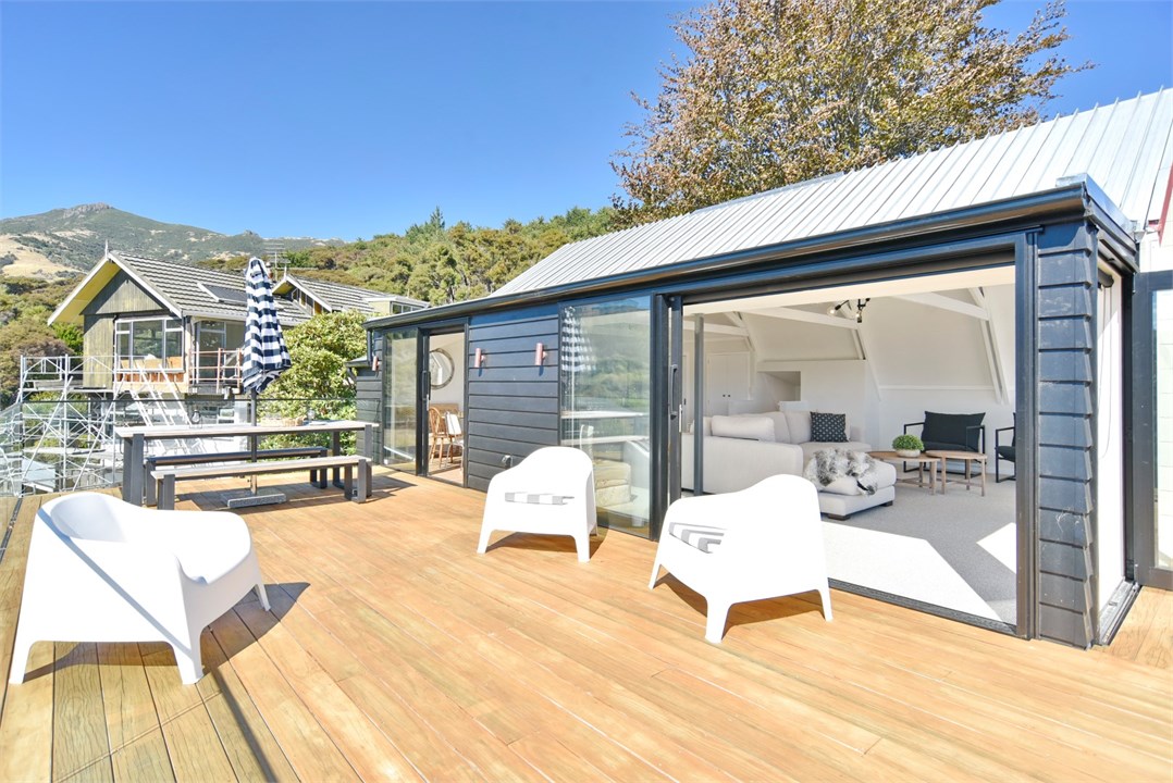 View of property building and seating areas