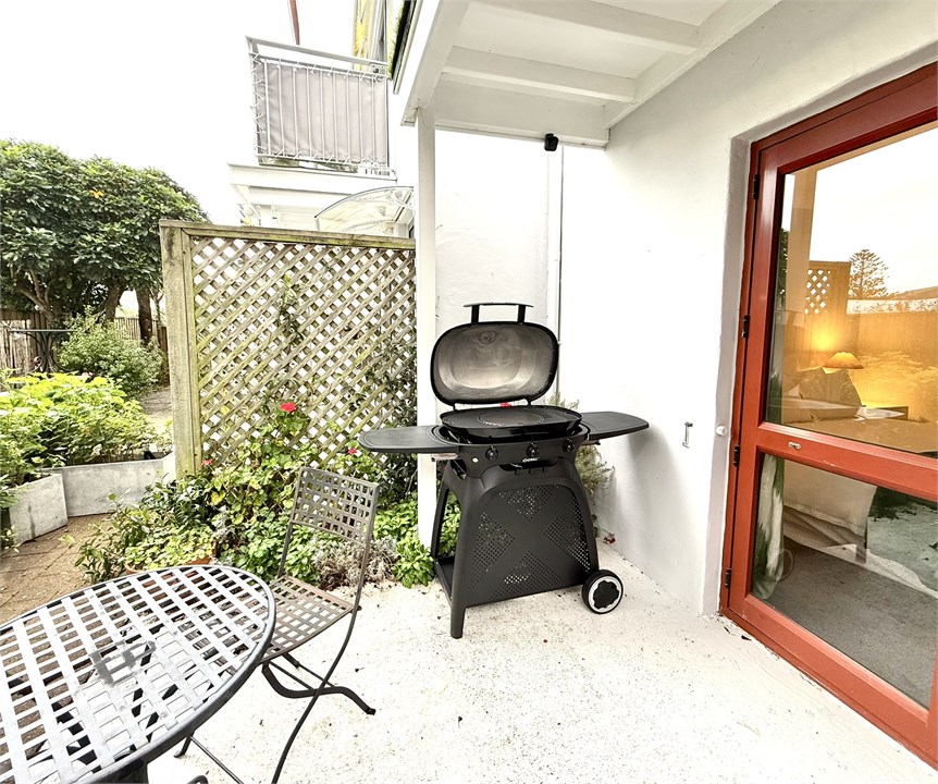 Outdoor area with a BBQ available