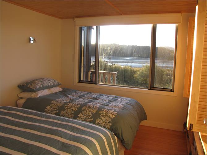 Second bedroom with two singles or one King bed