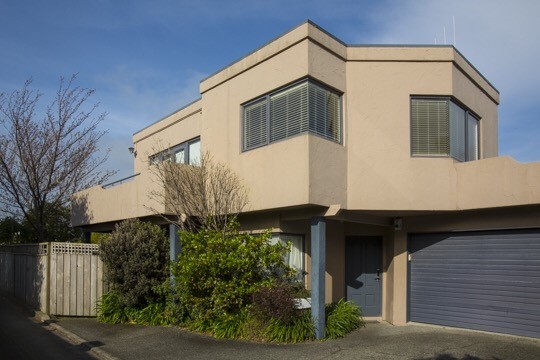 Up driveway, first townhouse