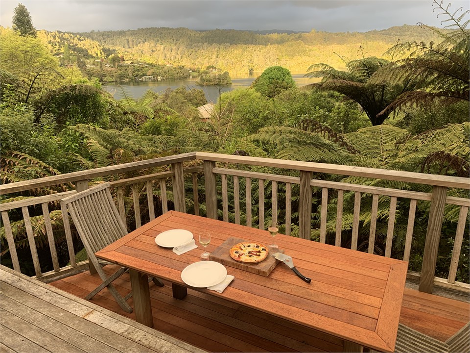 BBQ table nestled in private bush and lake views.