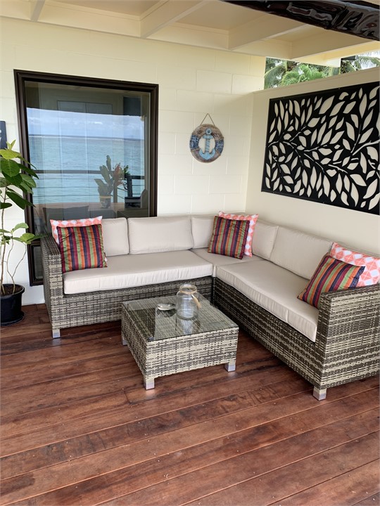 Outdoor seating decked area facing the lagoon