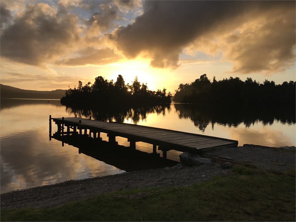 Winter sunset at the lake jetty