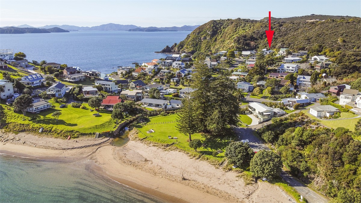 Sandy beach with boat ramp. Two minute walk