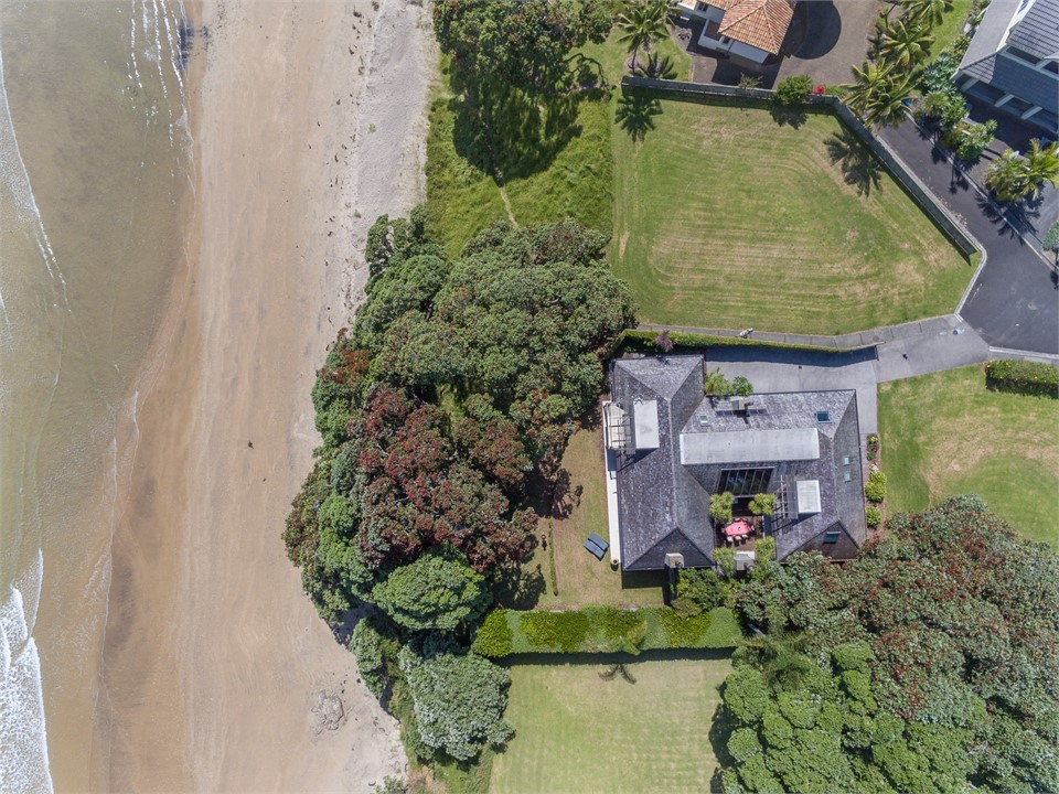 Lawns on 3 sides and Coopers Beach on the 4th.