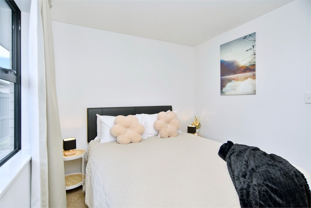 Bedroom 2 has a Queen bed