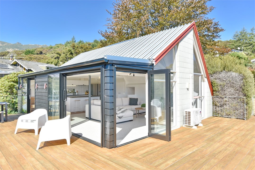 View of property building and seating areas