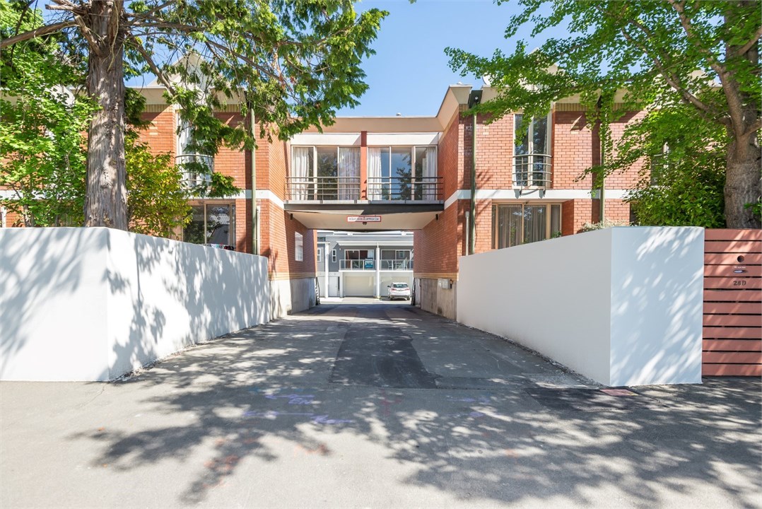 View of the driveway to the apartment block