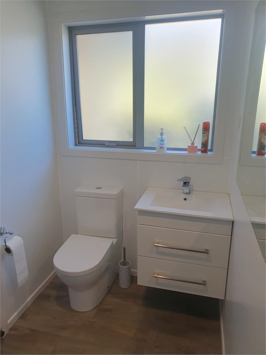 Second bathroom toilet and basin