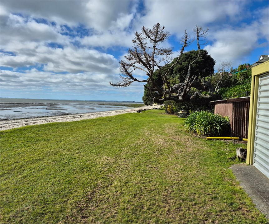 Boatshed and beach view