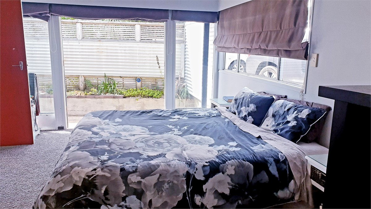 Main Bedroom access to outdoor patio