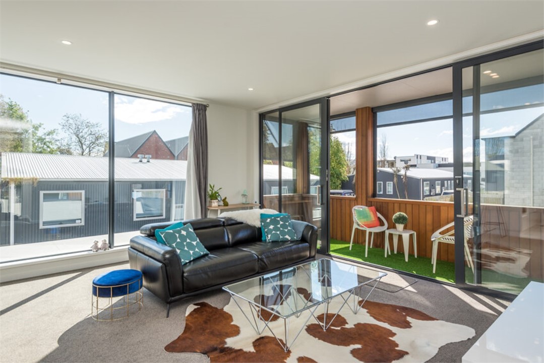 Living room and a balcony with a sitting area