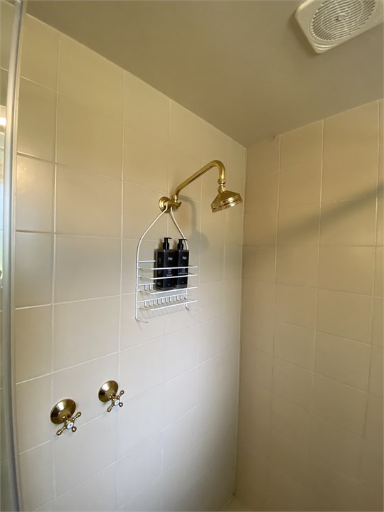 View of the shower in the bathroom