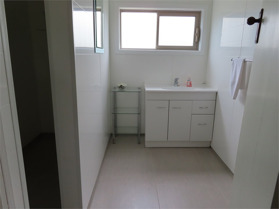 Bathroom with shower to left