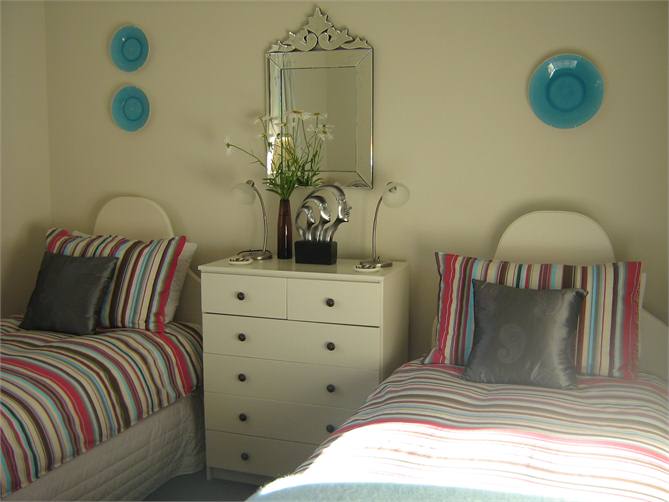 Bedroom 3 w three single beds