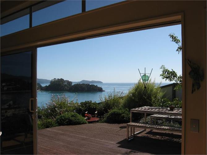 double-opening doors open directly onto deck