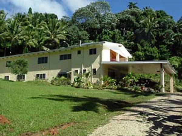 Stans Mansion surrounded by tropical gardens