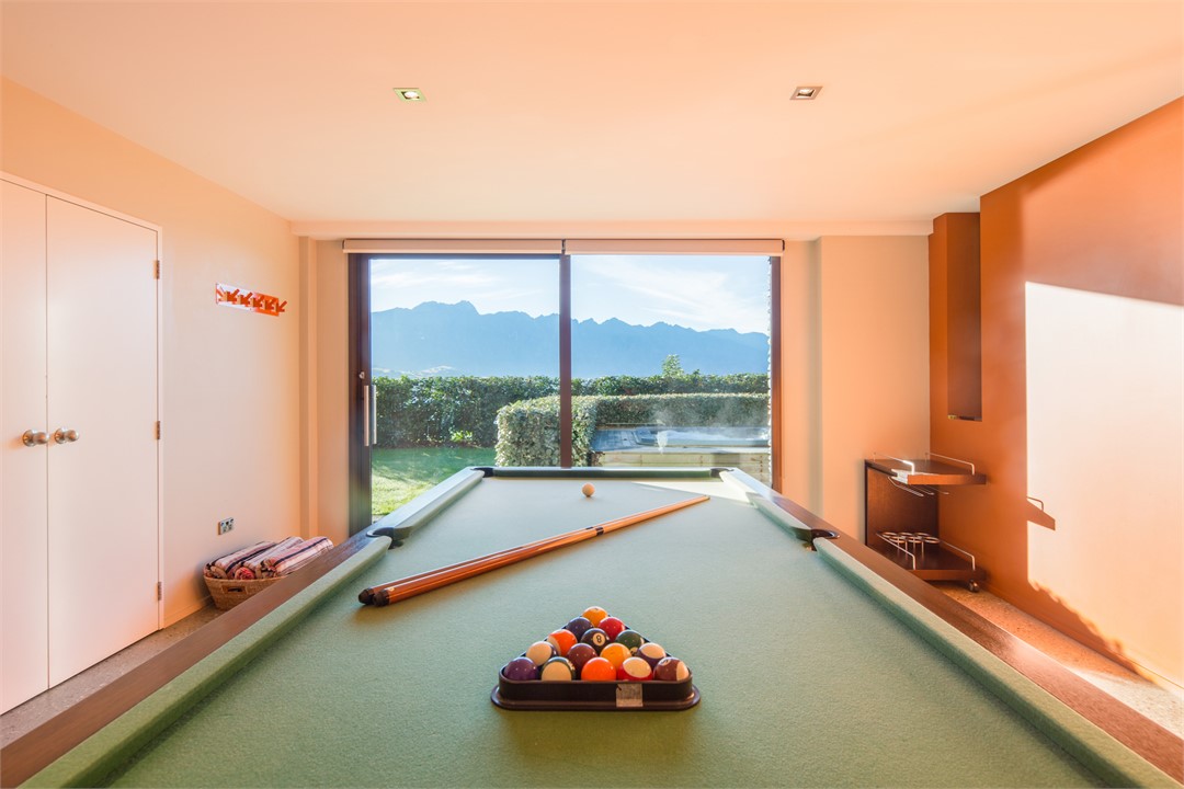 Games room with pool table and TV