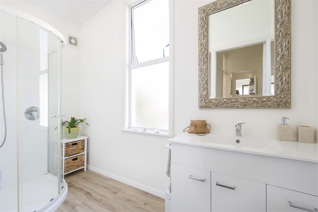 Bathroom with Shower & Vanity. Separate Toilet