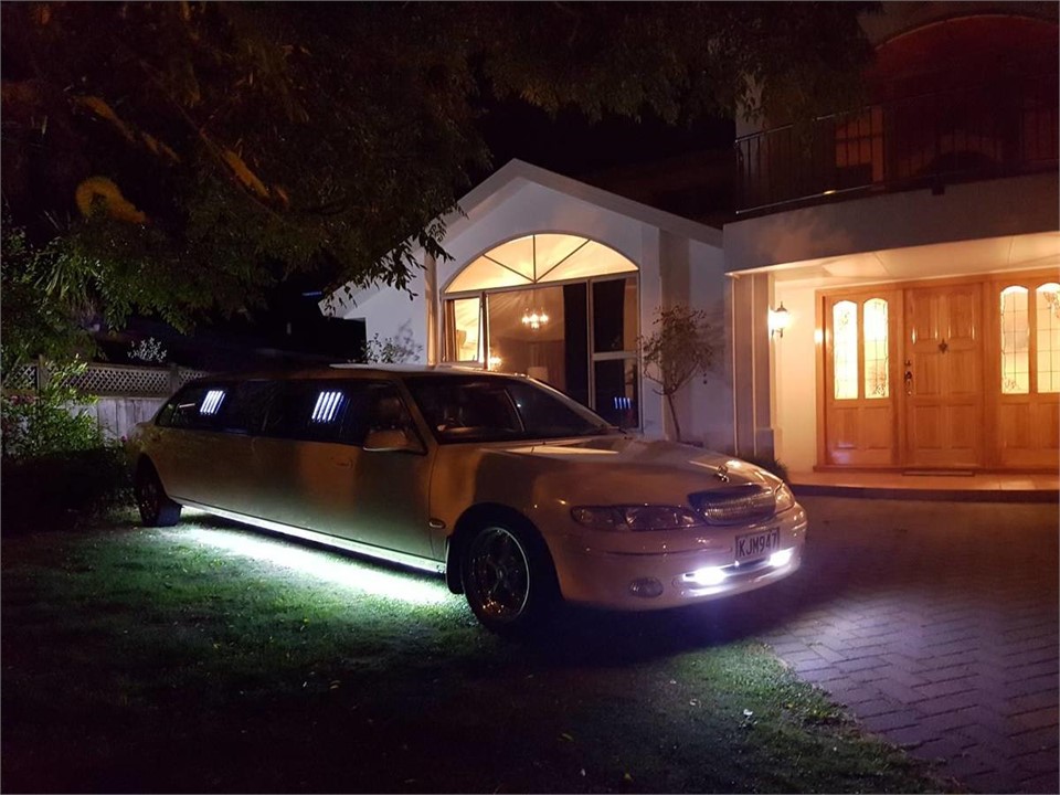 in-front of the house at night