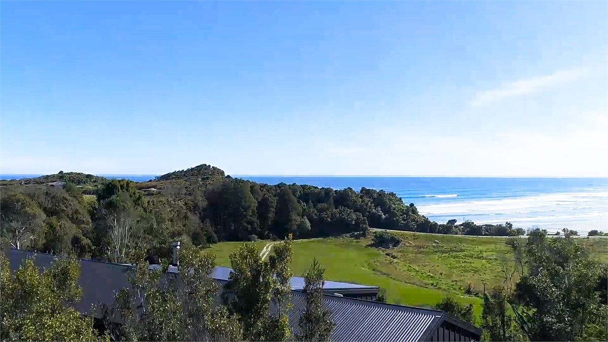 Aerial view of the home facing the Ocean