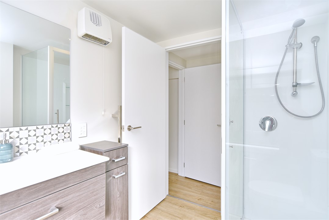 Bathroom 2 has a shower and a toilet