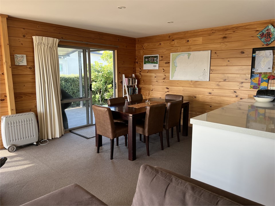 Dining area opening out onto the covered deck