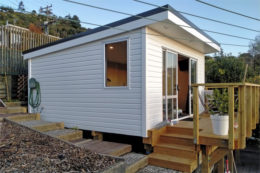 Bedroom 5 (Sleep-out) located at rear above house