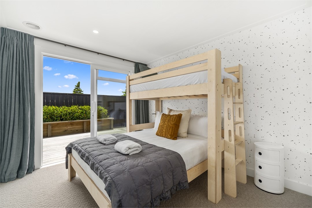 Single over Queen bed