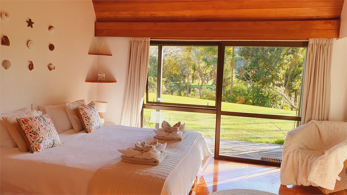 Master bedroom with super king bed and stunning vi