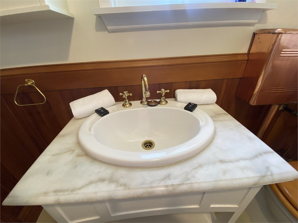 Bathroom has a shower and a toilet